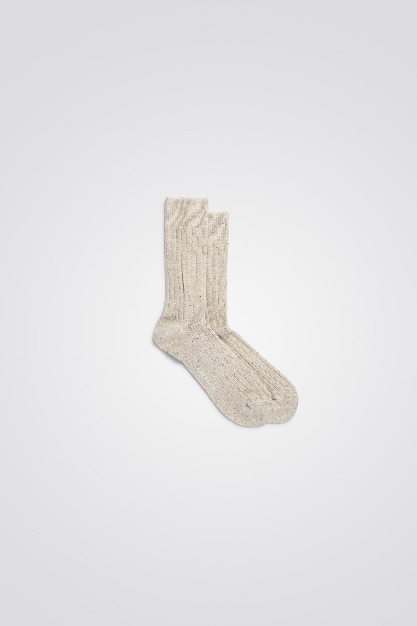 Norse Projects Chaussettes Bjarki Neps Wool Rib Ecru